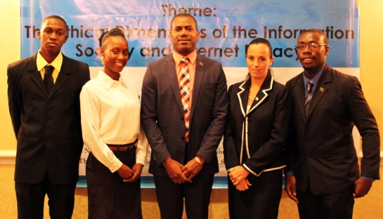 Photo: Youth Minister Hon. Shawn Richards has welcomed the new CARICOM Youth Ambassadors. From left to right; Amb. Trevis Belle, Amb. Mervil Nisbett, Min. Shawn Richards, Amb. Joy Napier, Dean & Amb. Dennis McCall Jr. Photo courtesy the Department of Youth.